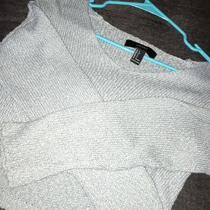 Long sleeve aqua crop top.